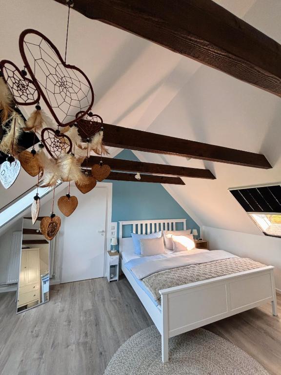 Lüttje Koje - Ferienhaus direkt am Deich und dem Meer dahinter - Bed and Breakfast Norden