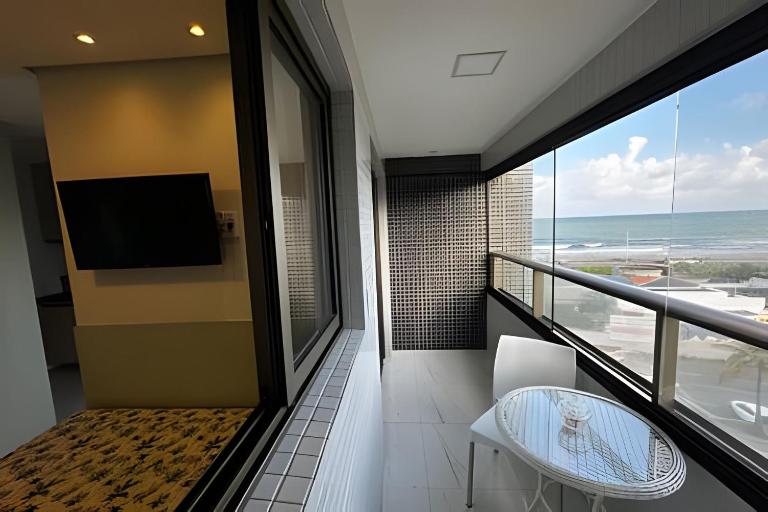 Quarto e sala com vista para o mar - B&B Salvador