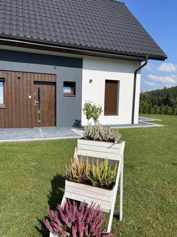 Agroturystyka Nad Lasem - Domki w górach - Ferienwohnung Toporzysko