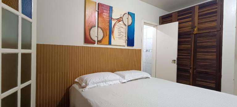 Apartamento térreo com ar condicionado e 2 suítes bem localizado - Ferienwohnung Garopaba