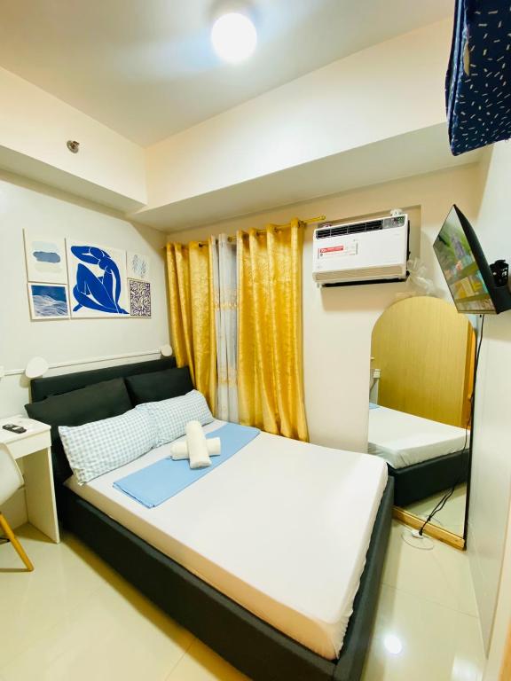 CondoStay in Quezon City by WE Staycation - B&B Manila