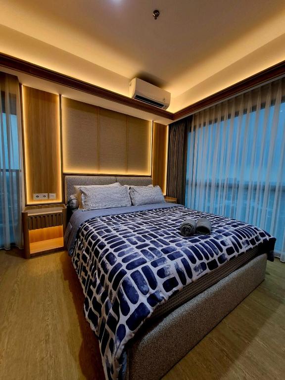 Apt Embarcadero 2BR Blu with Netflix and Pool By Damaresa - Ferienwohnung Pondokpucung