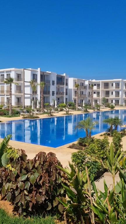 Appartement neuf meublé avec piscine - Chambres d'hôtes El Mansouria