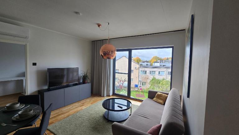 Raatuse street Apartment with parking - Chambres d'hôtes Tartu