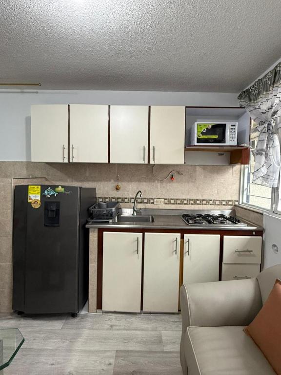 Acogedor Apartamento Pequeño e Independiente - Chambres d'hôtes Bogota