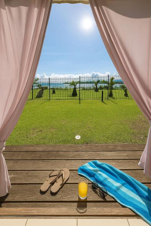 Studio le Colibri, Entre terre et mer, vue incroyable, citerne - B&B Le Gosier