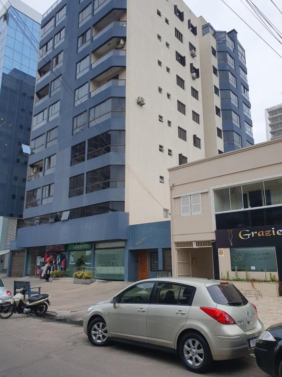 AP Completo-Centro de Torres, 4 quadras da Praia, com 2 quartos e 2 vagas de garagem - B&B Torres