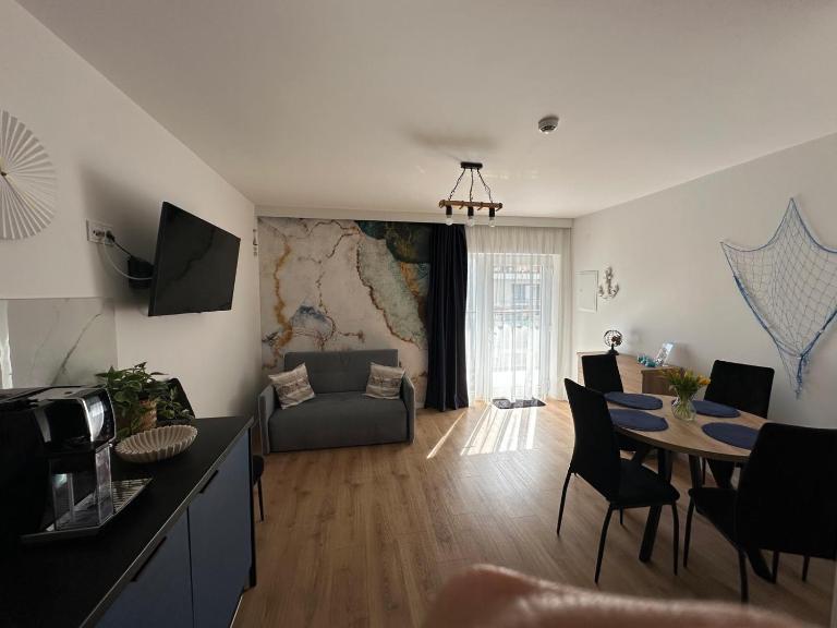 Apartamenty Modrzewiowa Enklawa Rowy Błękitna - Bed and Breakfast Rowy