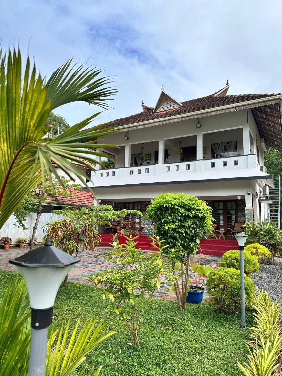 4elementis beach homestay - B&B Mararikulam