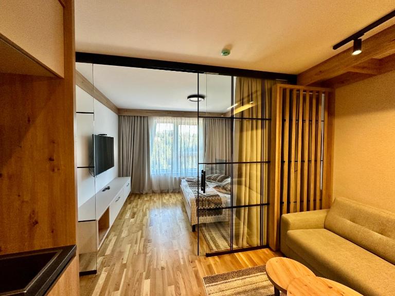 Apartman A55 Aparthotel Vučko privatni apartman - B&B Jahorina