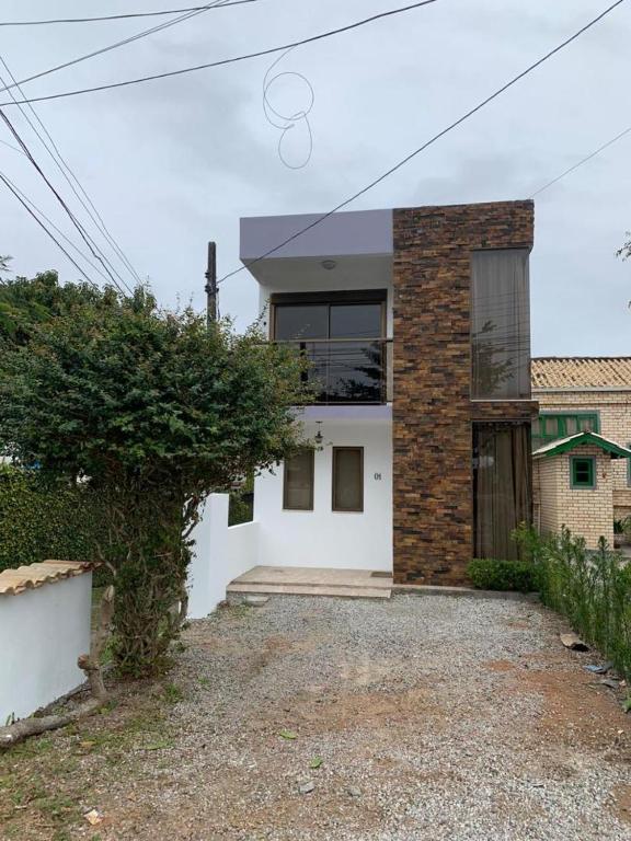 Casa a dois minutos da praia da Armação - Ferienwohnung Florianópolis