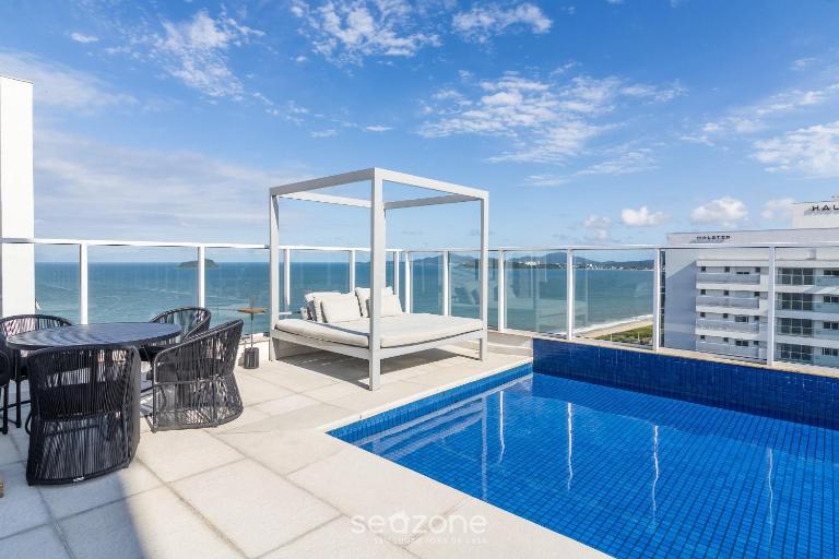 Aptos em Prédio com Piscina a 100 m da Praia - LTT - Bed and Breakfast Bugres