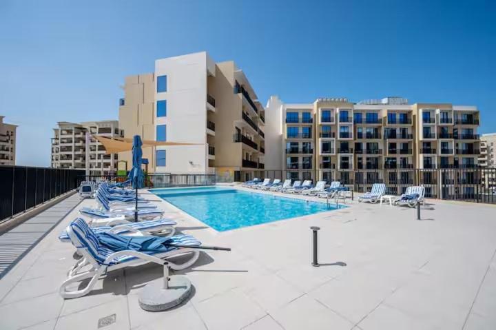 Private Beach 1BR-Yacht Club-Work Space-Pool-Gym - Ferienwohnung Ra’s al-Chaima