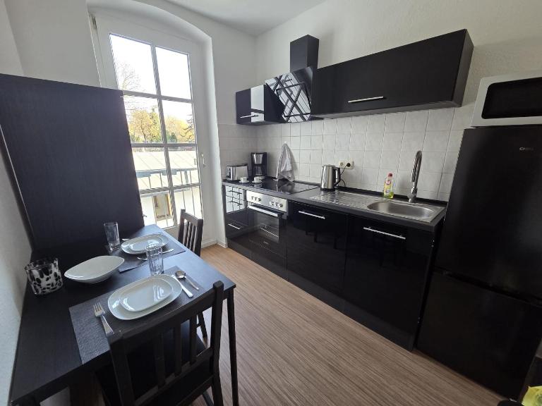 Stylische Flat1 mit französischem Balkon1 all-in 5G - B&B Gera