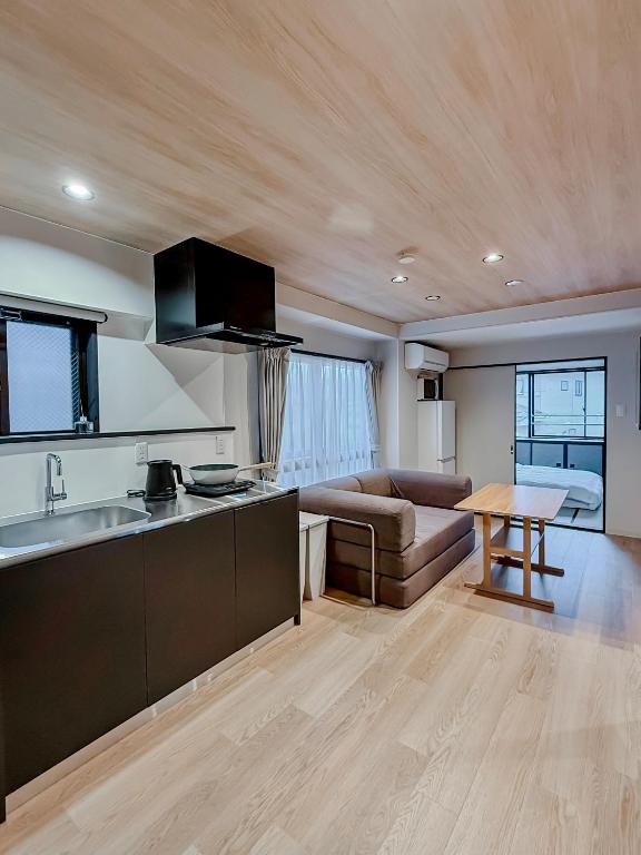 AURA YUZAWA Apartment Hotel - 1Bedroom Apartment with Living Dining Kitchen Sleeps 2 to 4, Bedroom with 2-Double Bed, Living Room with 1-Sofa Bed - B&B Yuzawa