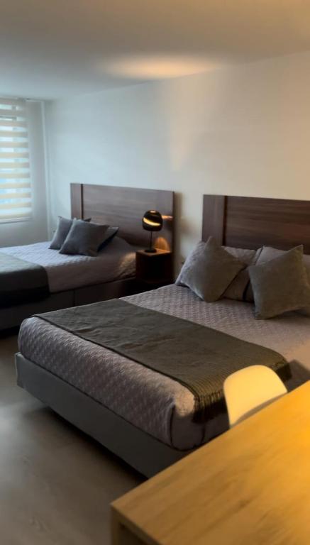 Apartahotel La Arboleda HC - B&B Manizales
