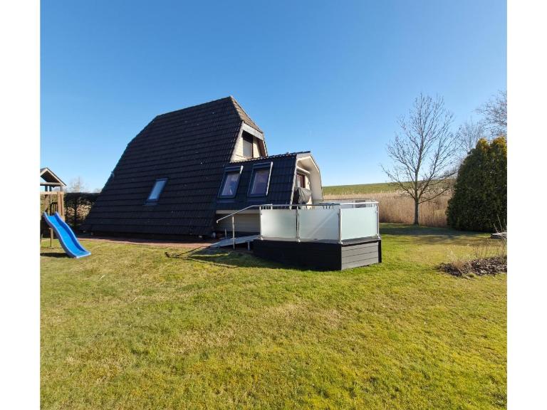 Nurdachhaus in Burhave - Chambres d'hôtes Bremerhaven