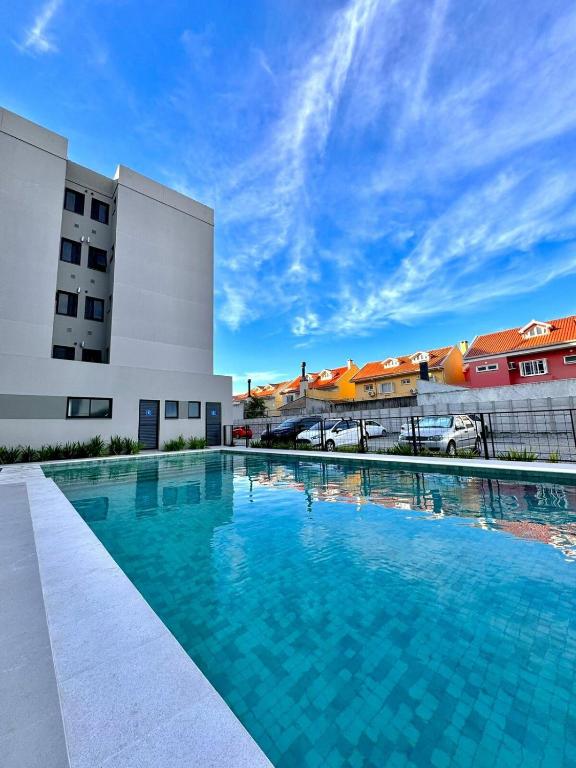 Churrasqueira, Ar, Piscina, Frigobar e muito mais - B&B Pelotas