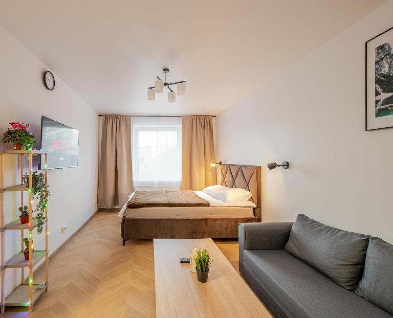 Cozy airport apartment - B&B Karmelava