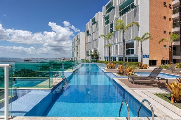 Aconchegante apartamento em Cloc Marina Residence - B&B Salvador