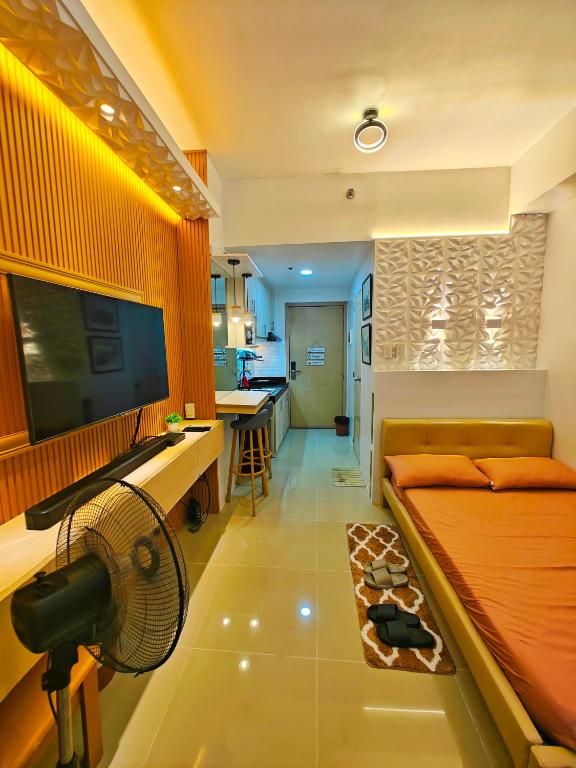 Cozy Studio at MPlace near Timog Quezon City - B&B Manila