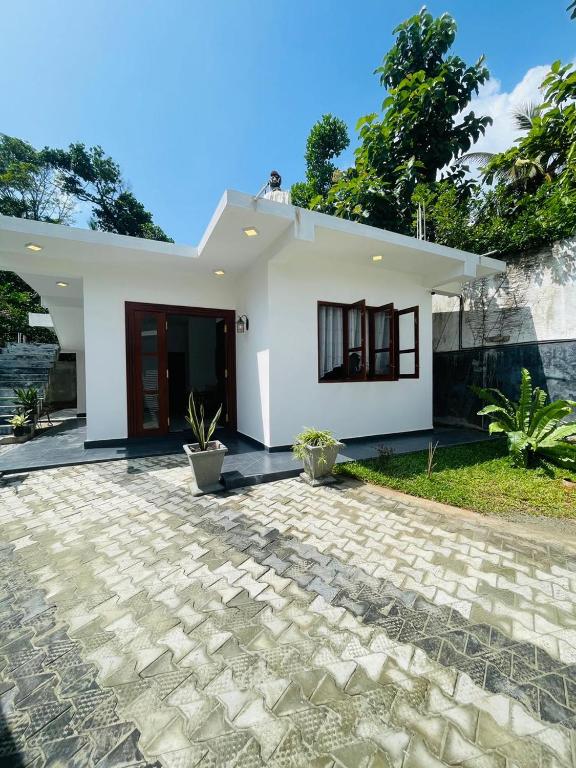 Sanu Villa - Chambres d'hôtes Weligama