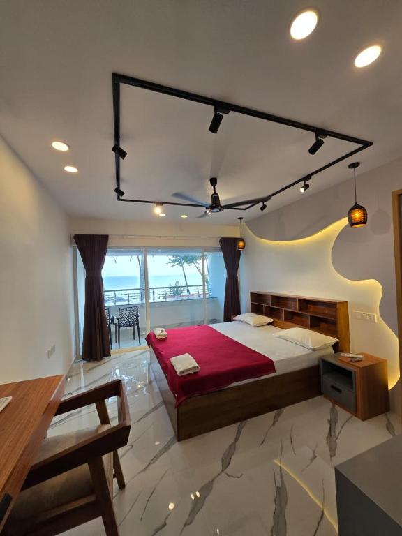 Karthik Villa - Chambres d'hôtes Varkkallai