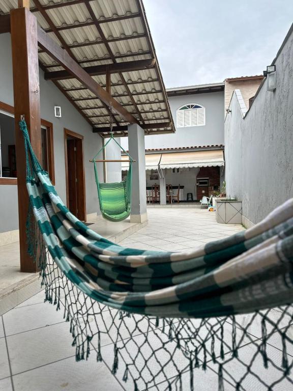 Casa 3 quartos a uma quadra do mar em Jacaraípe - Chambres d'hôtes Serra