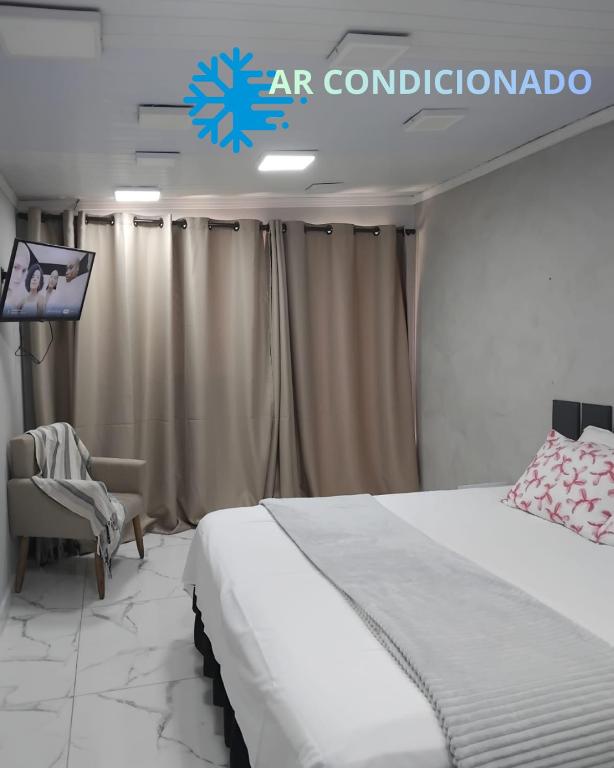 Hospedaria Recanto das Flores, perto Thermas - B&B São Pedro