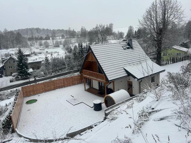 Apartamenty Słowianka-Chatka pod lasem - Bed and Breakfast Wolibórz
