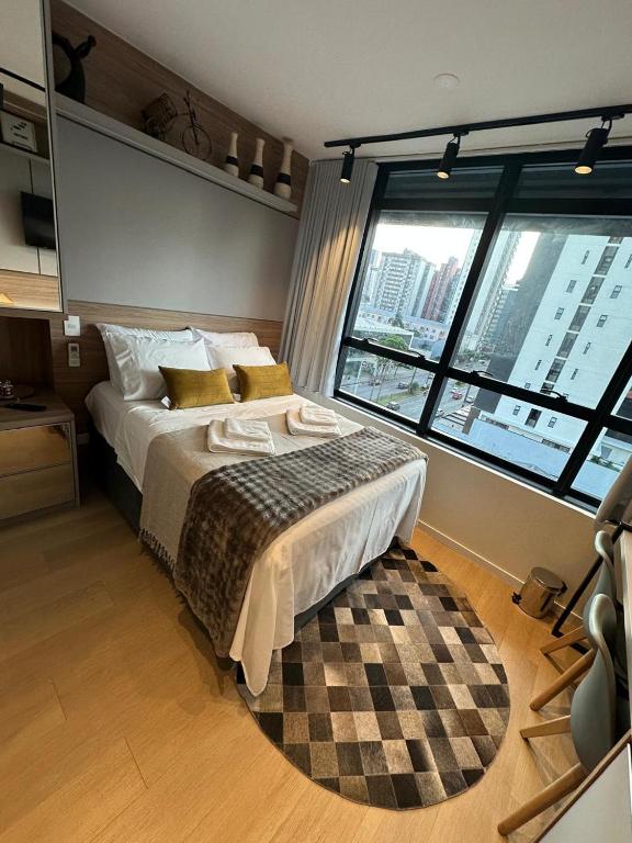 Studio perto Shopping Estação com Piscina interna aquecida, Academia e Terraço Lindo pôr do Sol - B&B Curitiba