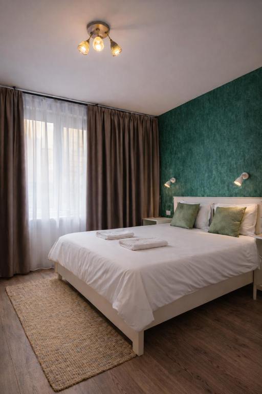 FUN HOUSE - Comfortable stay with garden and near parking - B&B Braşov