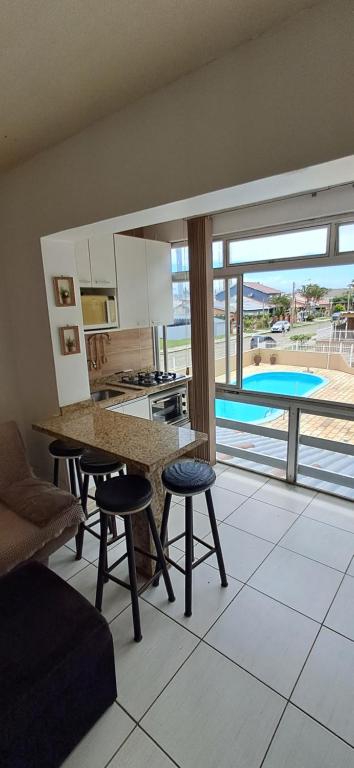 Apartamento com piscina, apenas 200 metros do mar - B&B Capão da Canoa