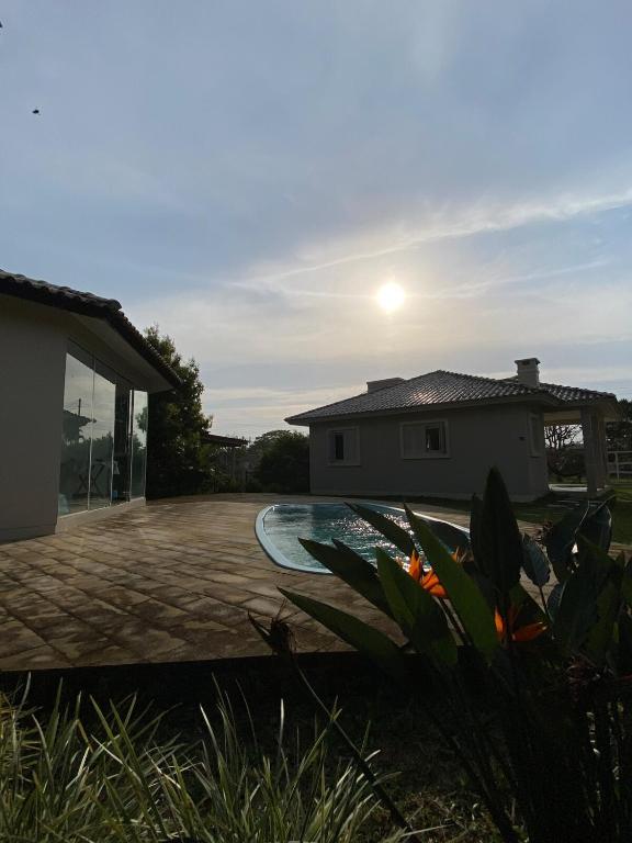 Casa com piscina para amigos e família - B&B Arroio do Sal