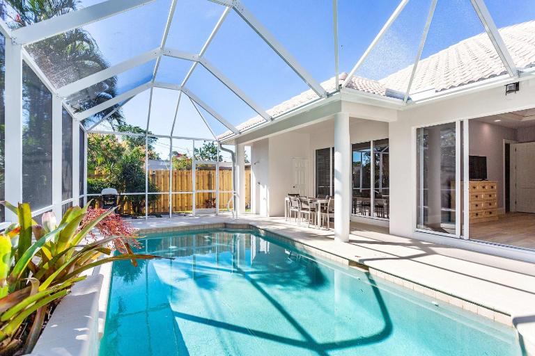 Imola Vacation Rental - Remodeled Pool Home Minutes from Vanderbilt Beach! Family-Friendly Retreat with 4 BR 4 BA and Private Screened Pool! - B&B Naples