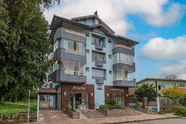 Rosa Residencial Solar das Hortênsias - Ferienwohnung Canela