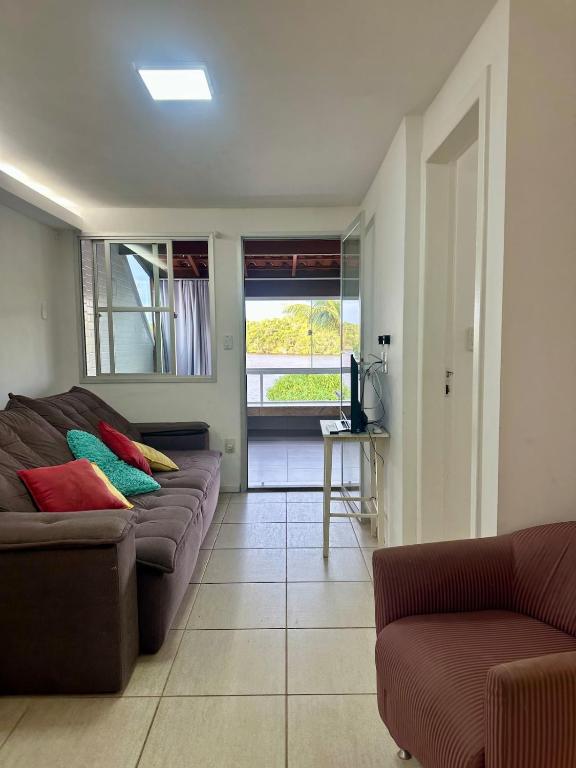 Apartamento confortável em uma vila de observadores de pássaros com vista para a lagoa! - B&B Guarapari