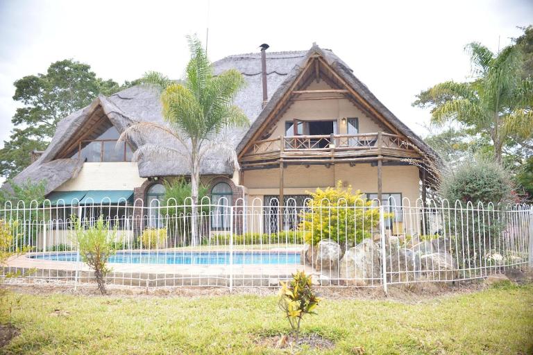 4 Bed Thatched Double Storey with pool No events or Parties - B&B Harare