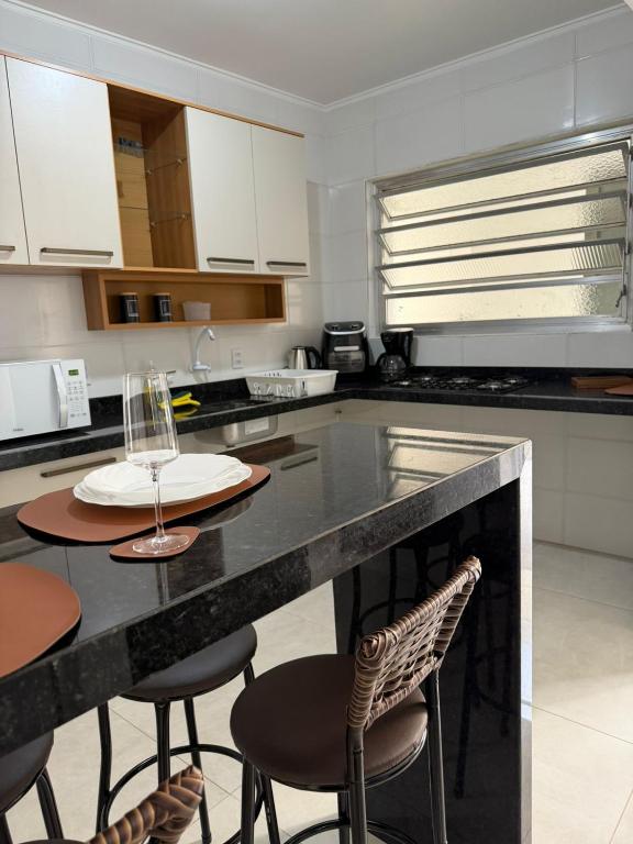 Apartamento térreo no Centro de Tramandaí, com ar condicionado, garagem e churrasqueira - B&B Tramandaí