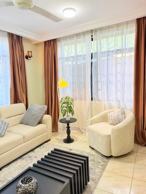 StayDar Cozy 2-Bedroom Apartment close to the city - B&B Dar es-Salam