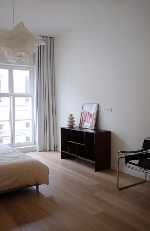 Design appartement met zonnig terras bij Gravensteen - Bed and Breakfast Gent