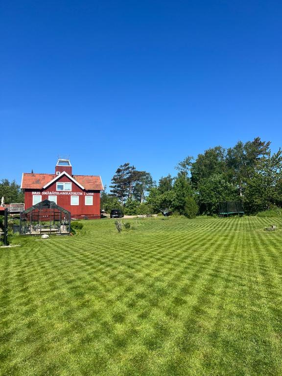 Unik villa med utsiktstorn, orangeri och badtunna - Chambres d'hôtes Lysekil