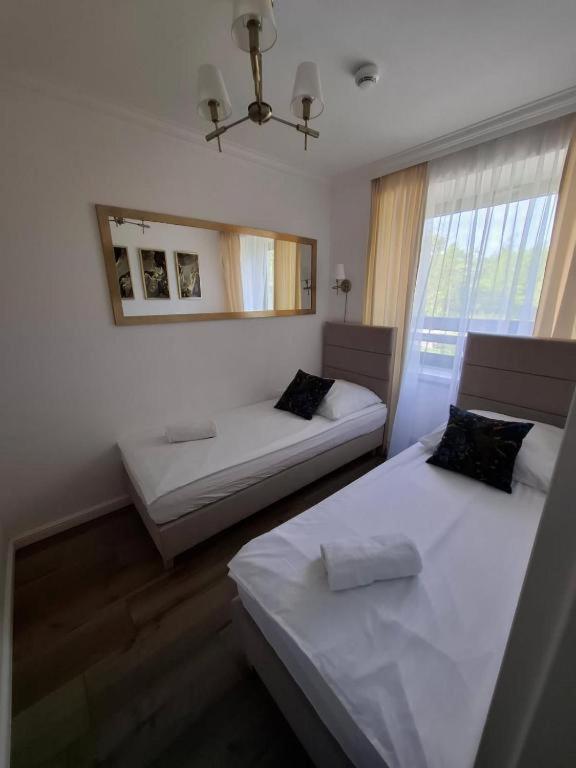 Palmowy Zakątek 2 pokoje dla rodziny Apartament Deluxe - B&B Serock