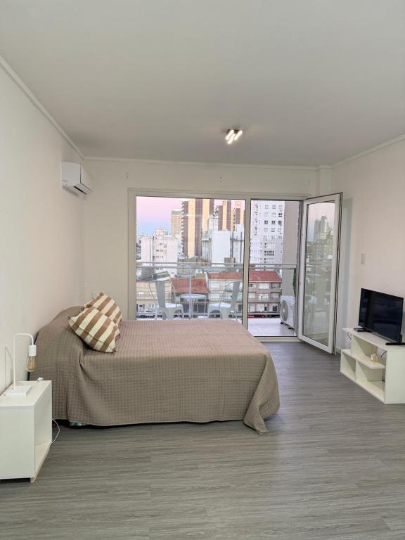 Depto a estrenar a media cuadra del mar con amenities - Chambres d'hôtes Necochea