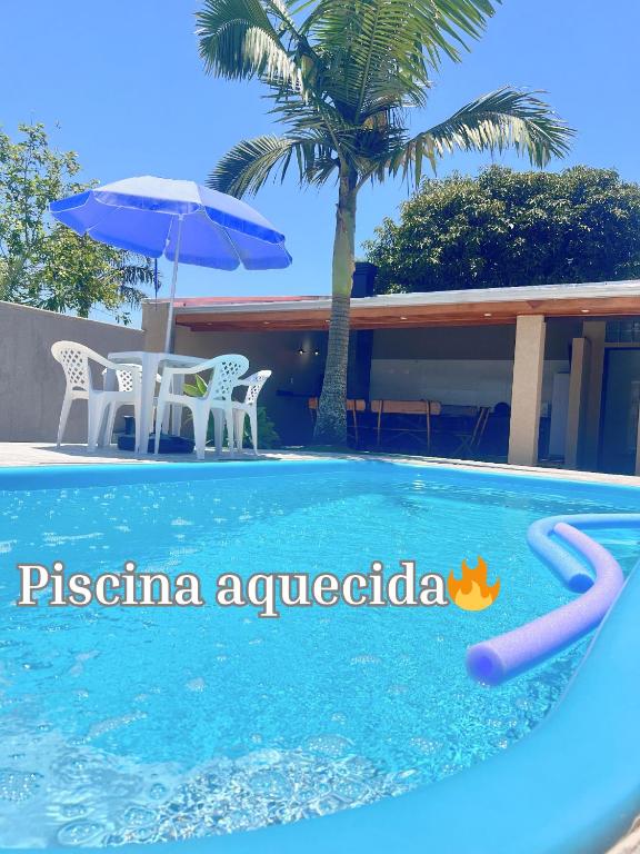 Recanto da Palmeira - Piscina aquecida, quartos com ar condicionado - B&B Guaratuba