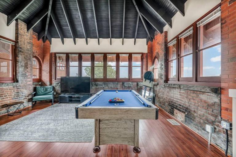 Urban Industrial Penthouse | Game Room Pool Table - B&B Cleveland