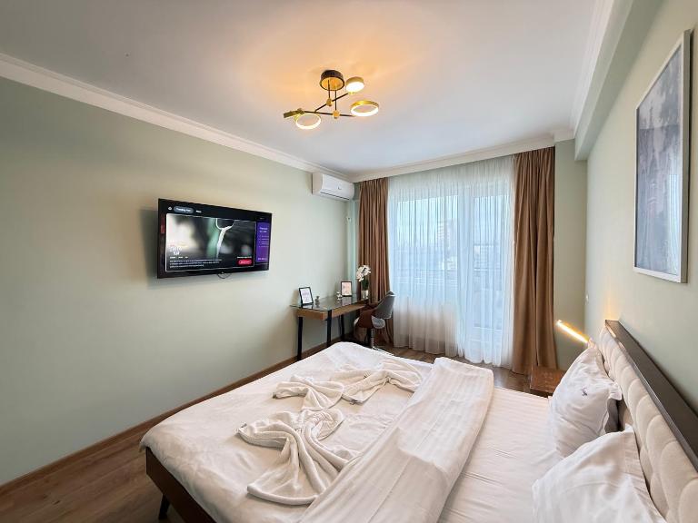 Q Deluxe Collection - Palas Commercial Center - Chambres d'hôtes Iași