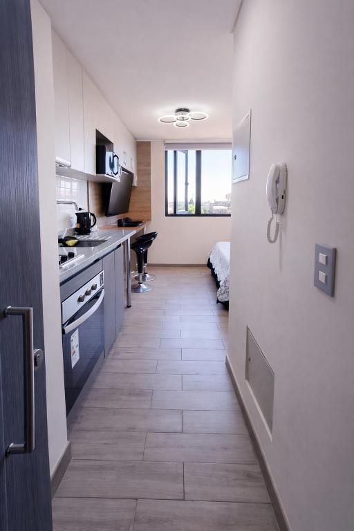 Estudio Moderno y Cómodo, Piso 7 Centro Chillán con Parking Opcional - Chambres d'hôtes Chillán