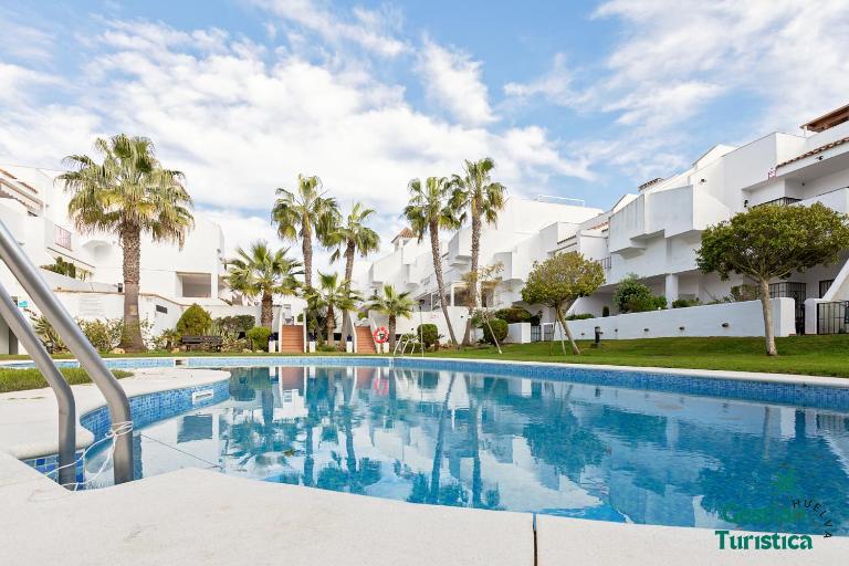 Piso en urbanización con piscina, pádel, tenis y golf - B&B Isla Cristina