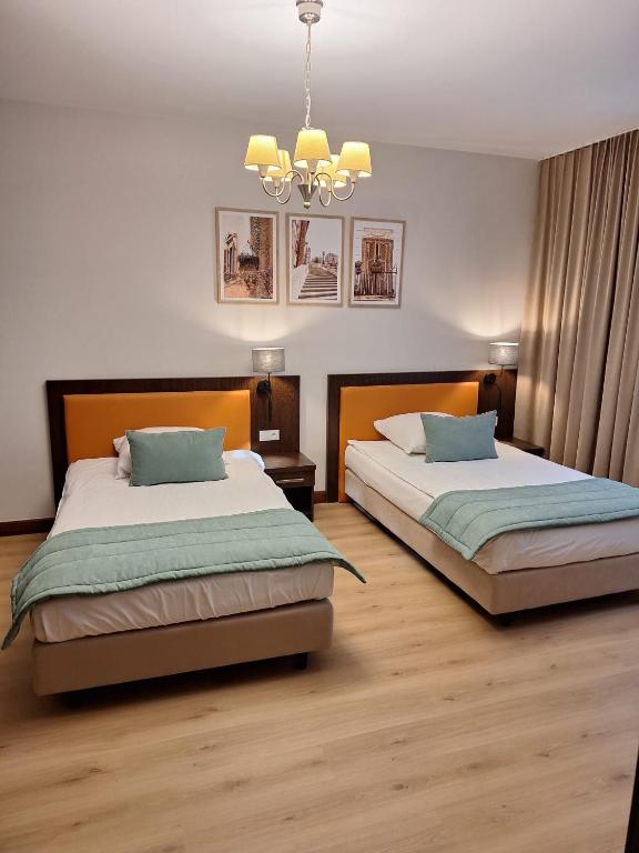 Pokoje De Luxe Figaro - Ferienwohnung Płock